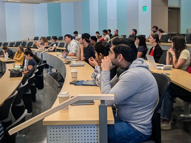 DDB Symposium Audience Listens to Keynote Presentation